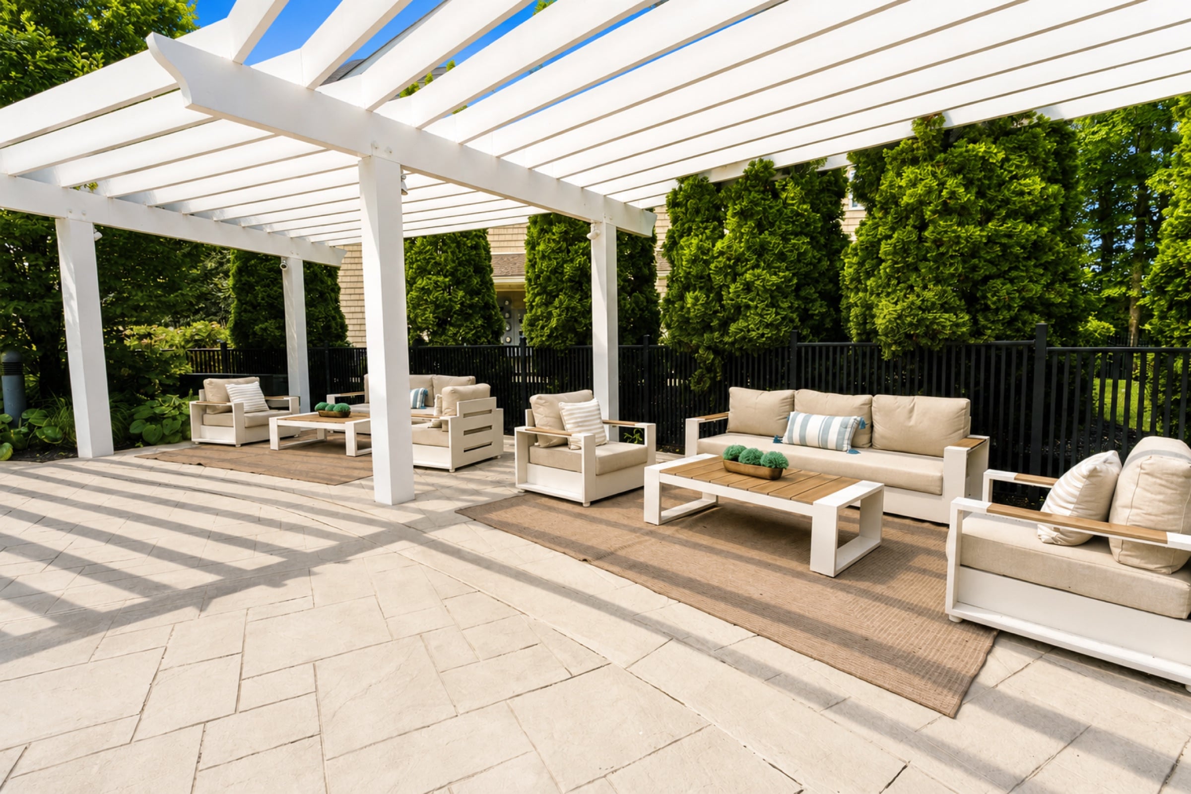 Pergola cabanas beside the White Oaks pool
